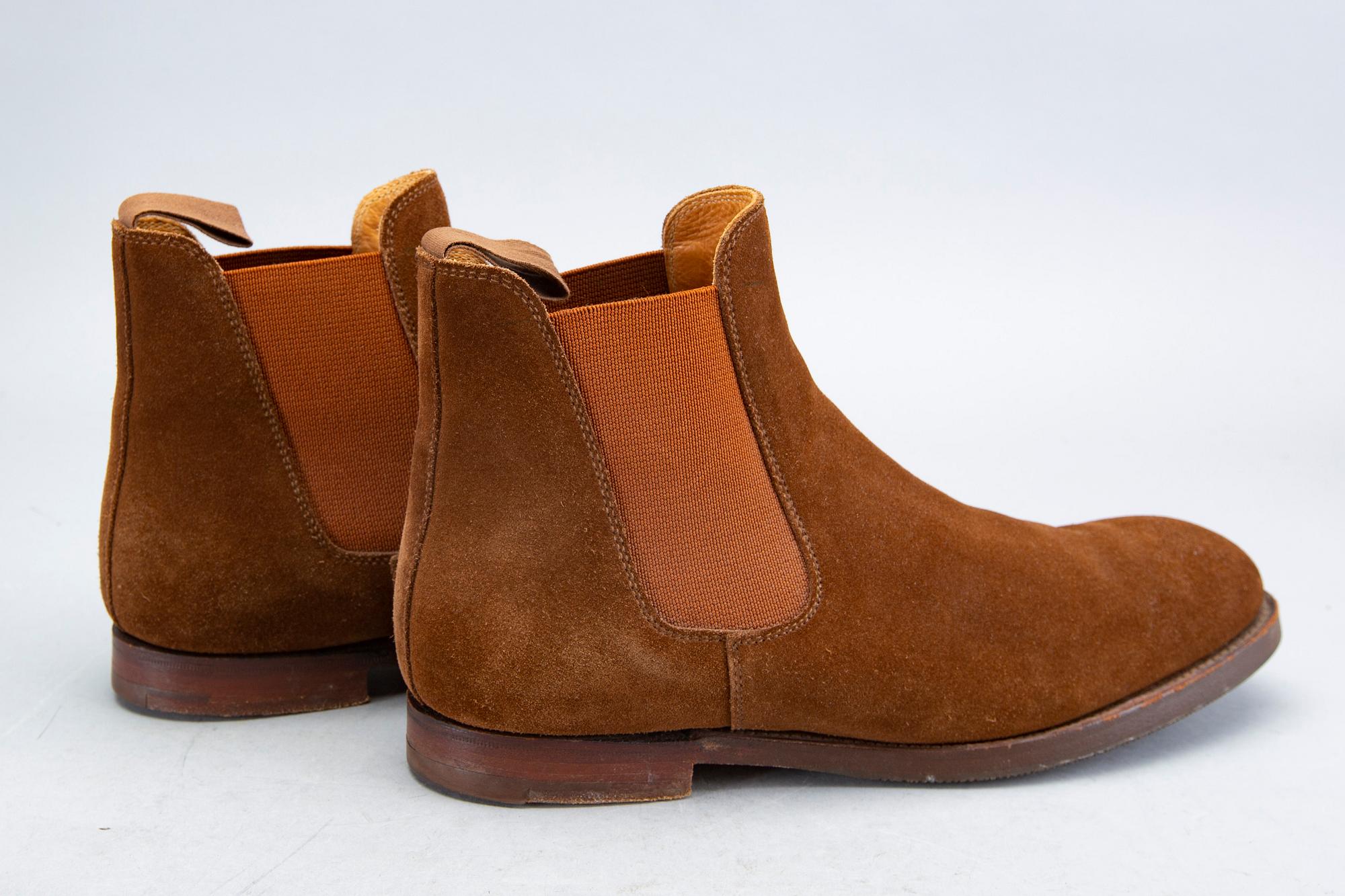 A pair of brown suede 'Gresham' Crockett & Jones boots.