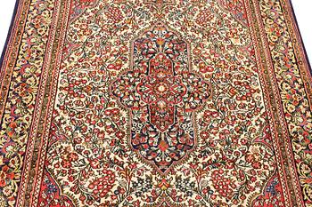 A Ghom rug, c. 202 x 137 cm.