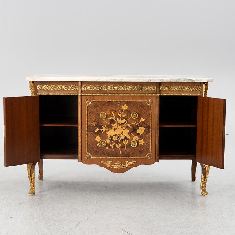 A chest of drawers, Louis XVI style, mid 20th Century.