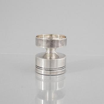 Eric Löfman, a Swedish silver candlestick, a vase and four cups, including MGAB, Uppsala 1977.