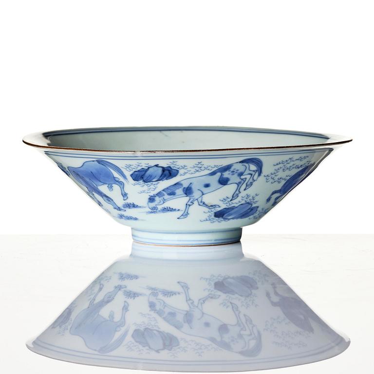 A blue and white 'eight horses of Muwang' bowl, Qing dynasty, Shunzhi period, mid 17th century.