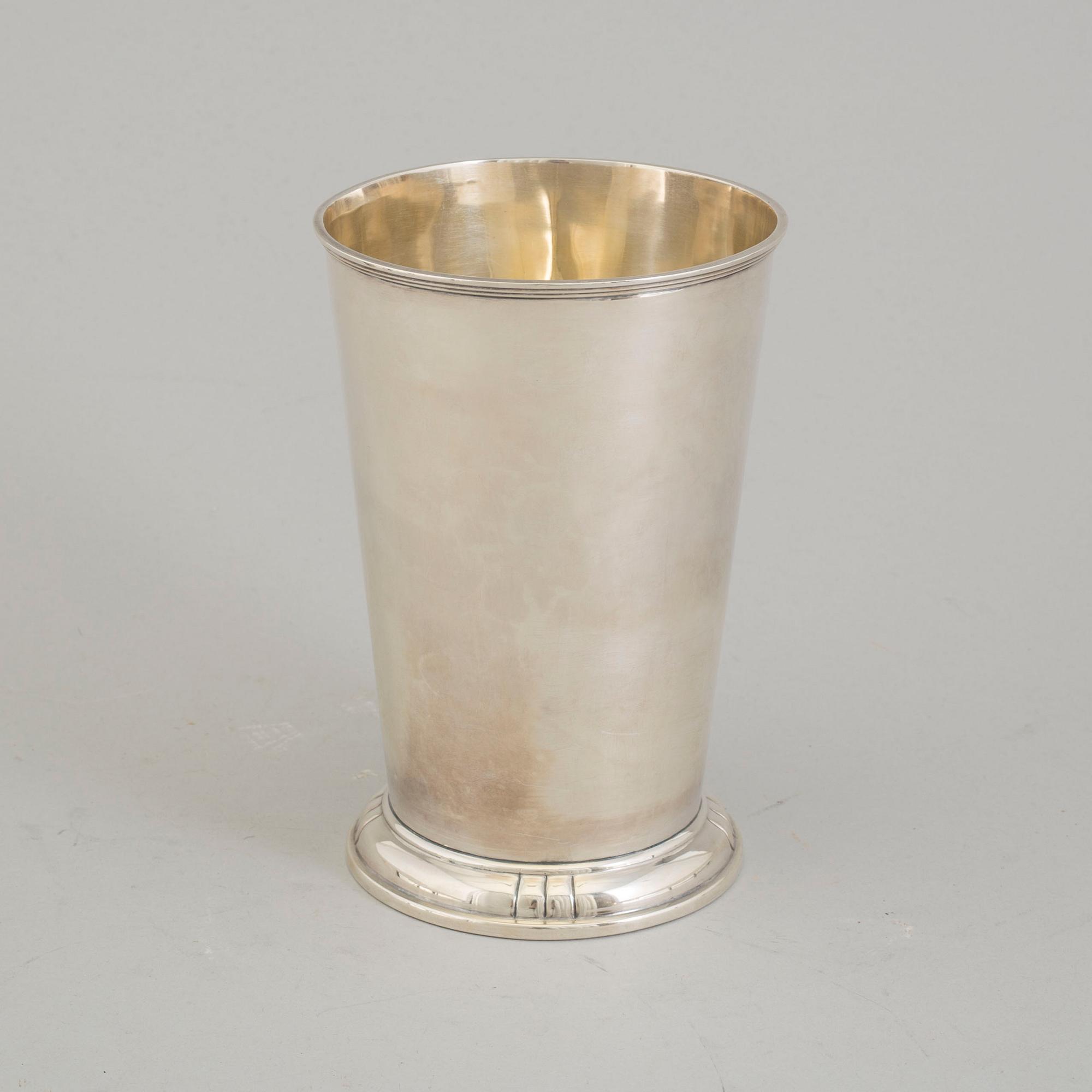 A parcel-gilt sterling silver vase from Aktiebolaget Ikora, Stockholm, 1953.