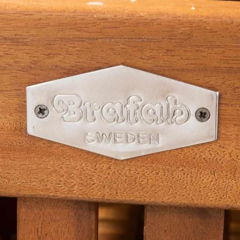 A 9 pcs stained teak garden suite by Brafab around 2000.