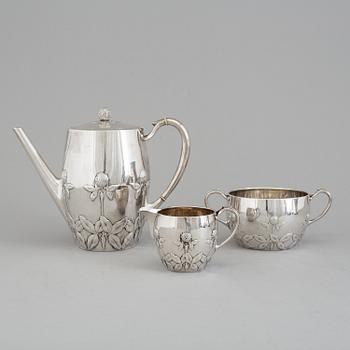 A Danish Arts and crafts sterling silver three piece coffee set, Niels Georg Henriksen for A. Michelsen, 1906 and 1921.