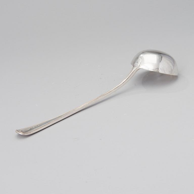 A soup ladle in sterling silver, mark of George William Adams, London 1867.