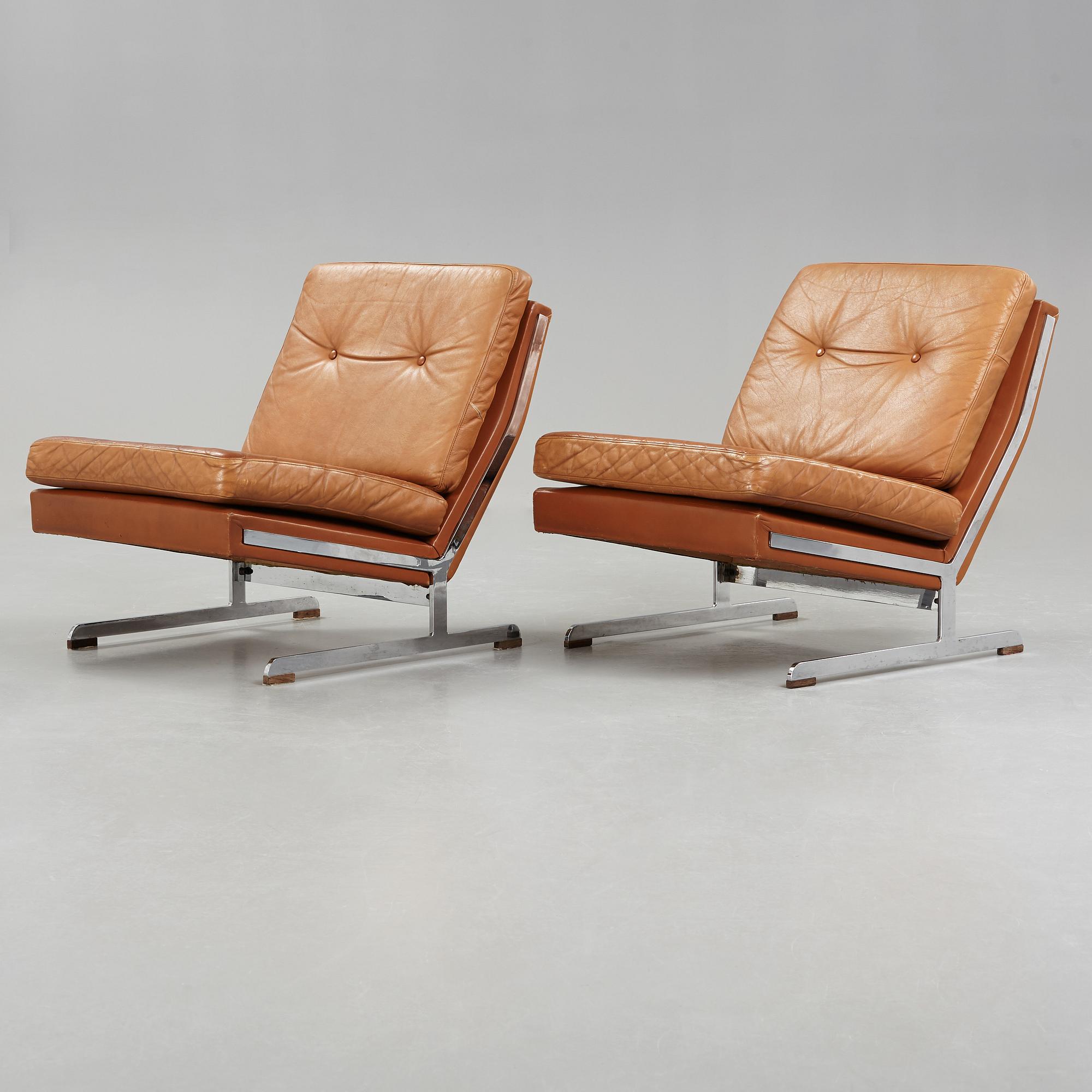 A pair of Poul Nørreklit chromed steel and brown leather easy chairs, Selectform, Denmark 1960's.