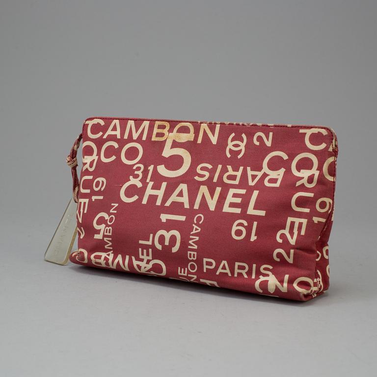 A TOILET BAG by Chanel.