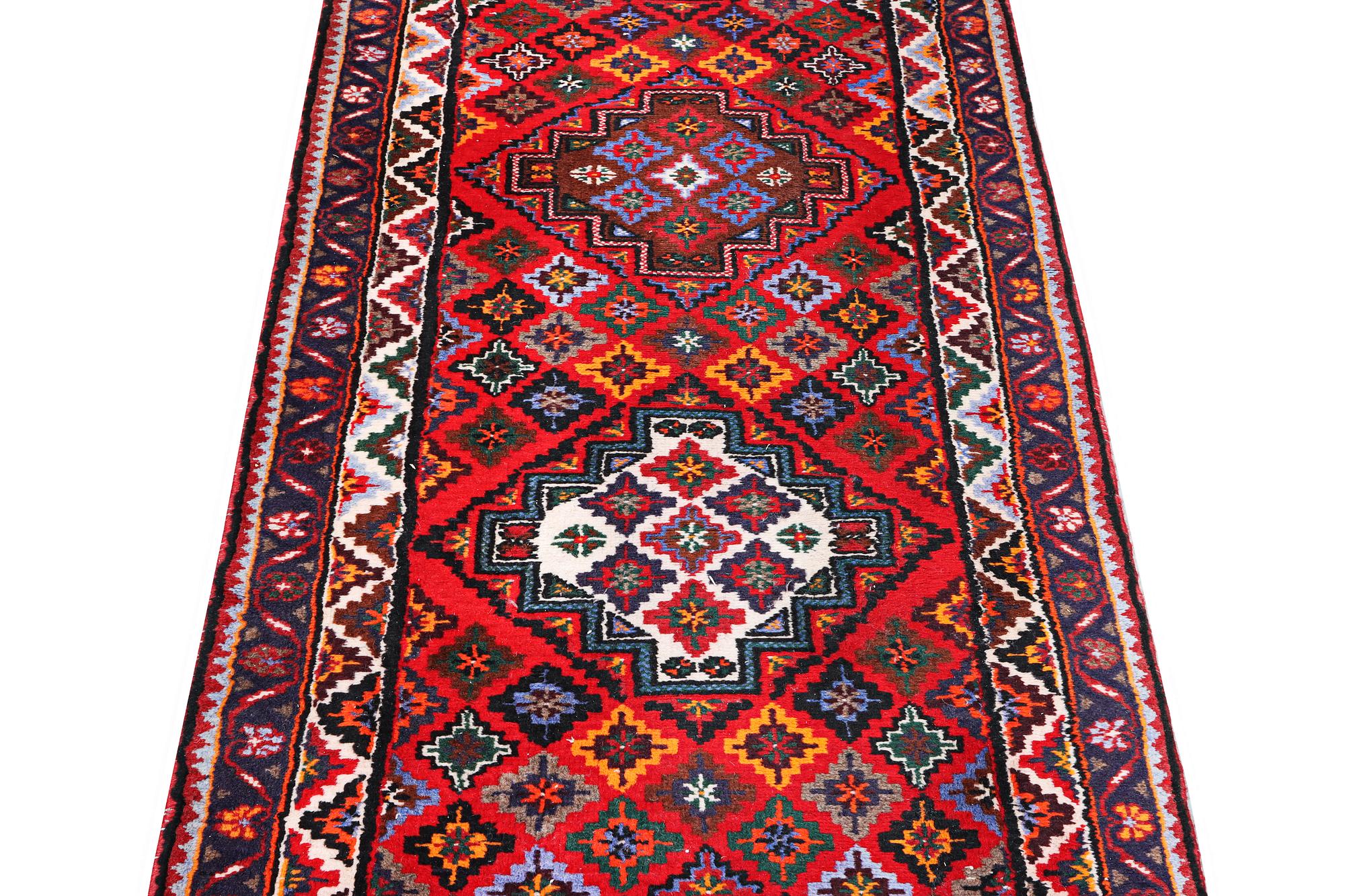 A runner carpet, Hamadan, c. 335 x 86 cm.
