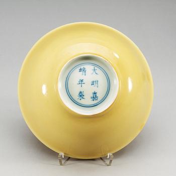 A yellow glazed bowl, Ming dynasty, with Jiajings six character mark and of the period (1522-66).