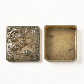 A well carved green stone box with cover, China, 20th century.