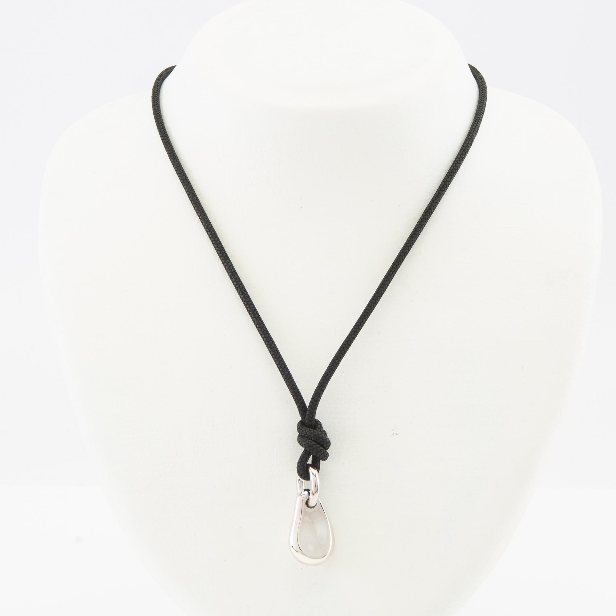 Ole Lynggaard, "Mini drop" silver and waxed textile, design by Charlotte Lynggaard.