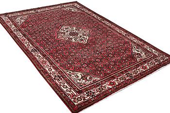 A Hosseinabad carpet, c. 310 x 210 cm.