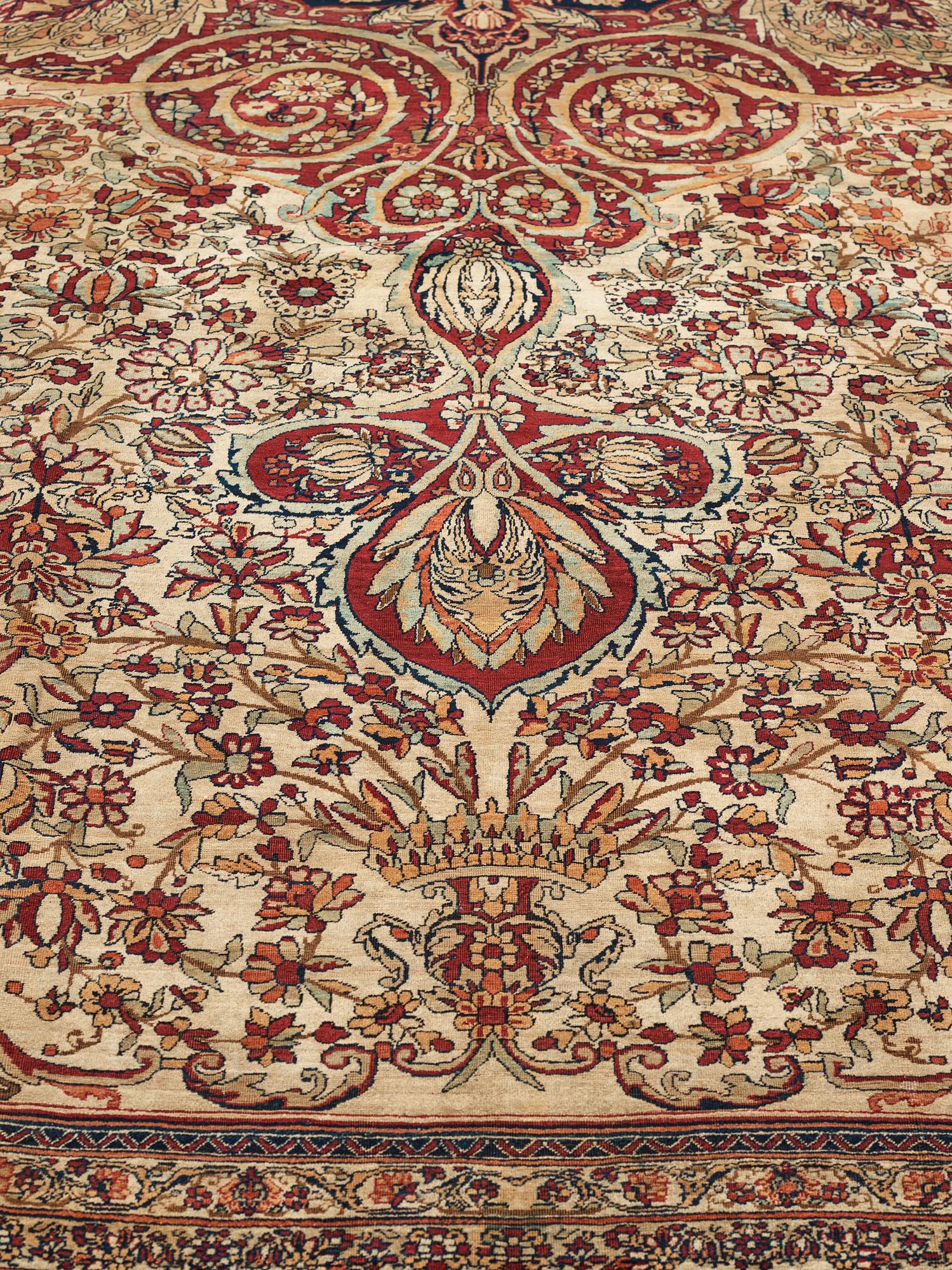 A carpet, an antique Kerman Laver, ca 677-688,5 x 510,5-526 cm.