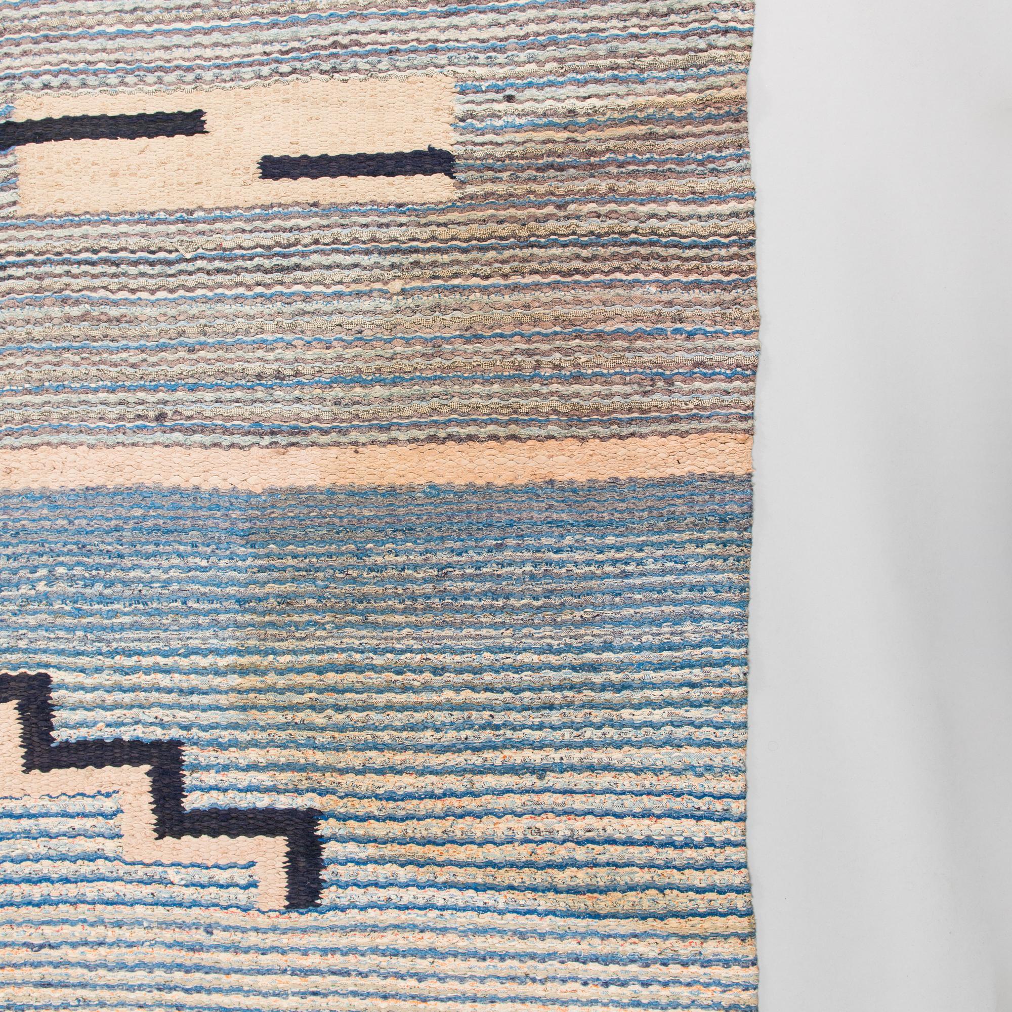 A 1930's Finnish rag rug. Circa 325 x 225 cm.