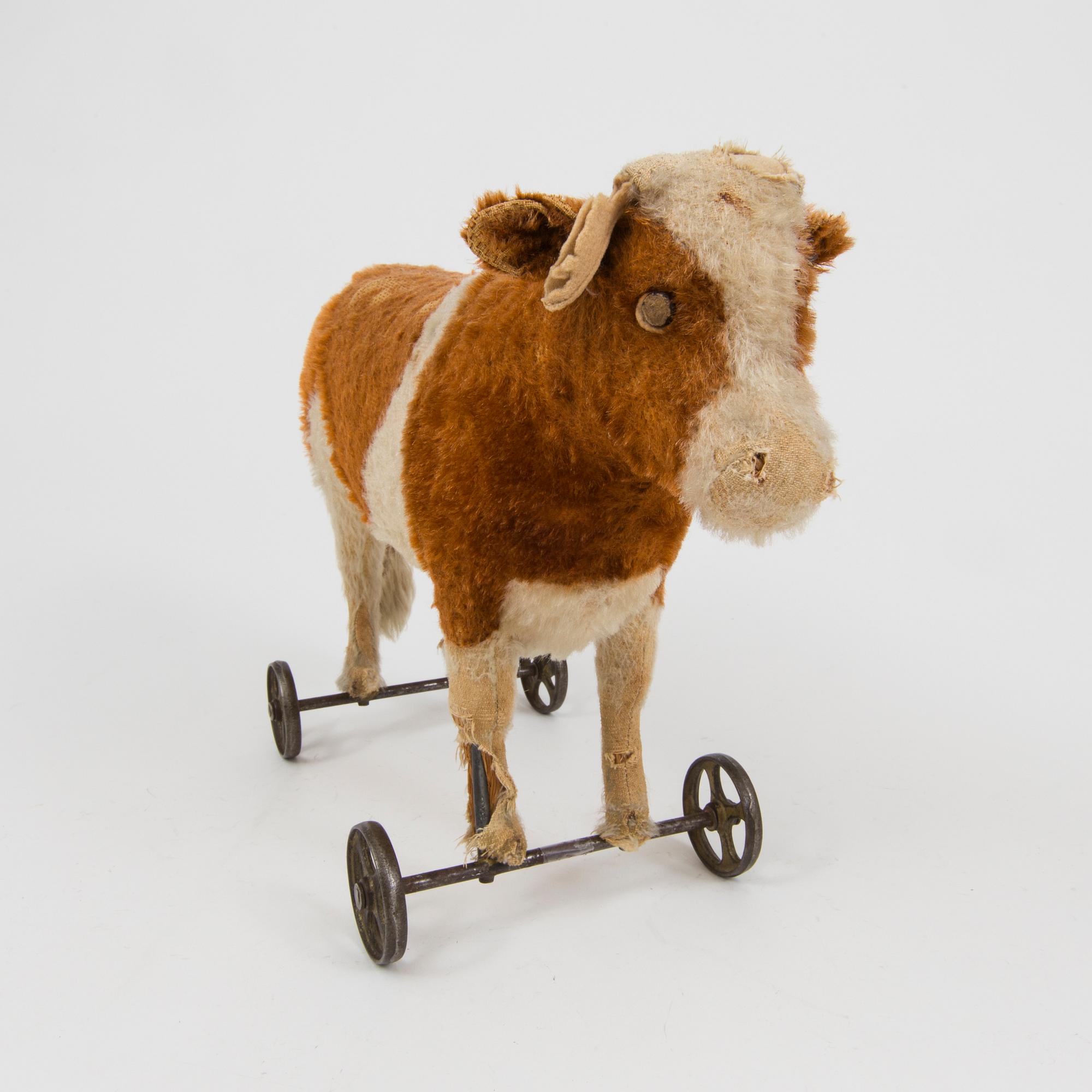 Steiff cow on wheels best sale