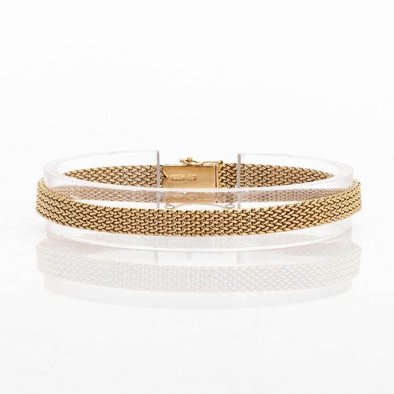 An 18K gold bracelet, Grün Huge & Co.