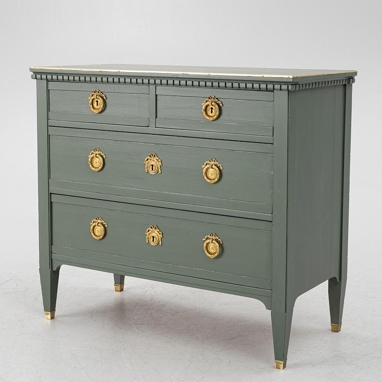A Gustavian style chest of drawers, circa 1900.