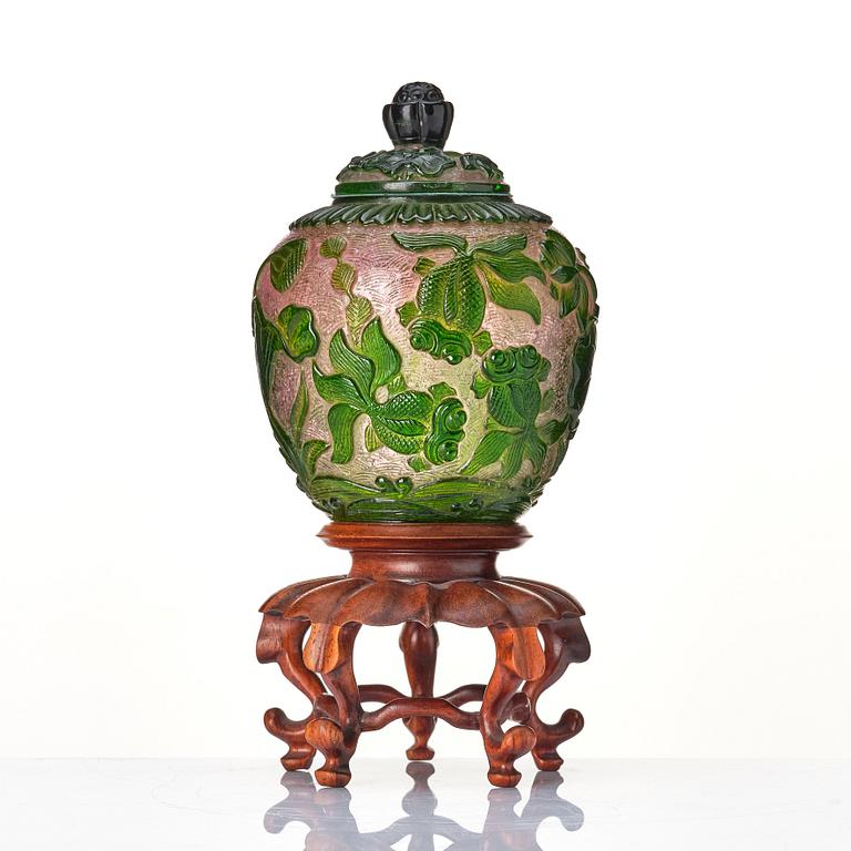 A peking glass jar with cover, Qing dynasty, with Qianlongs four character mark.