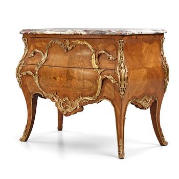 17. A Louis XV-style commode late 19th century.