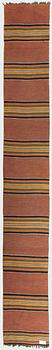 A 1930/1940s rag rug /runner. Circa 550 x 74 cm.