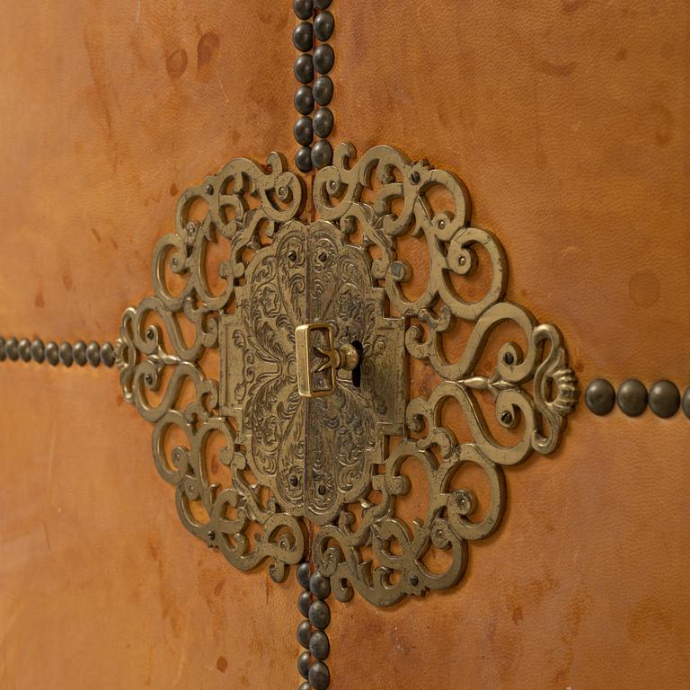 A leather, oak and mahogany cabinet, mid 20th Century.