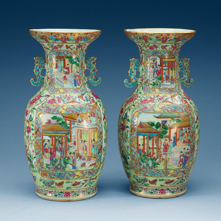 A pair of famille rose Canton vases, Qing dynasty, 19th Century.