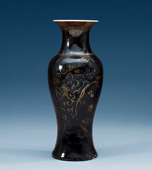 1556. A black vase decorated in gold, Qing dynasty, Qianlong (1736-95).
