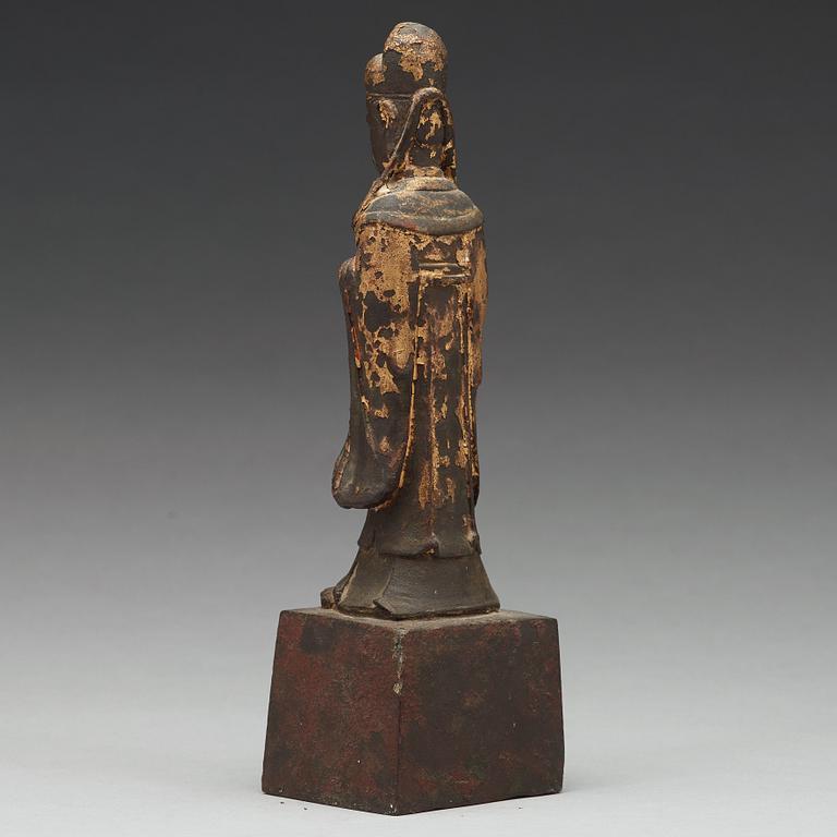 A copper alloy figure of a daoist dignitary, late Ming dynasty (1368-1644).