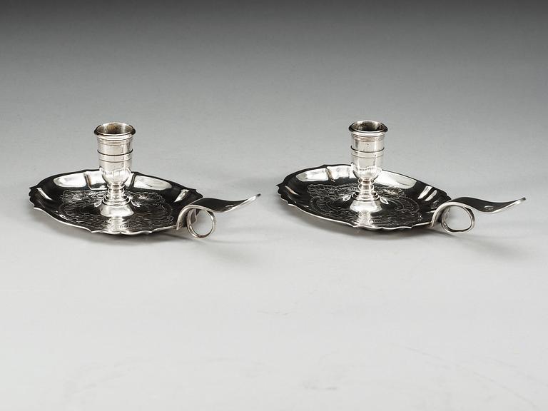 A pair of Swedish 18th century silver chamber-candlesticks, makers mark of Gustaf Stafhell d.ä., Stockholm 1747.