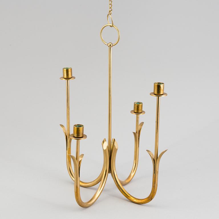 A brass candelabrum by Gunnar Ander for Ystad Metall.