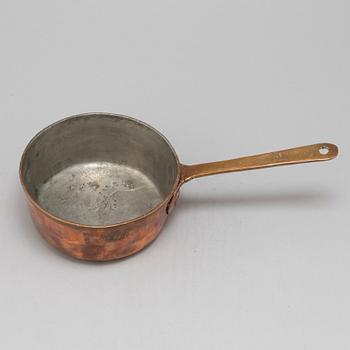 A copper saucepan marked FG 1756.