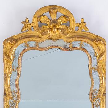 An 18th century rococo mirror.