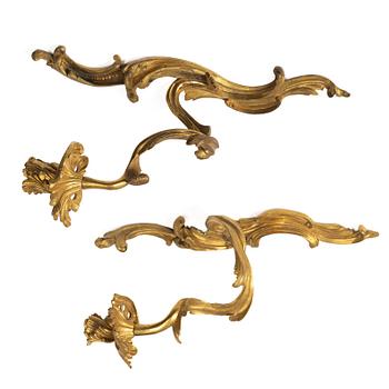 A pair of Rococo-style appliques, France, circa 1900.