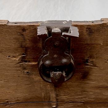 A 18th century baroque oak chest with iron mountings.