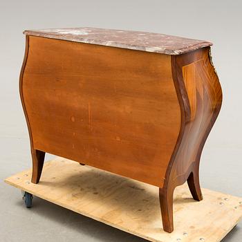 A Rococo-style chest of drawers, mid 20th century.