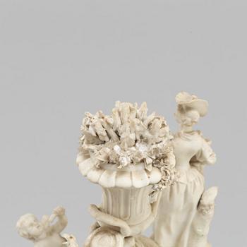 A porcelain figurine group circa 1900.
