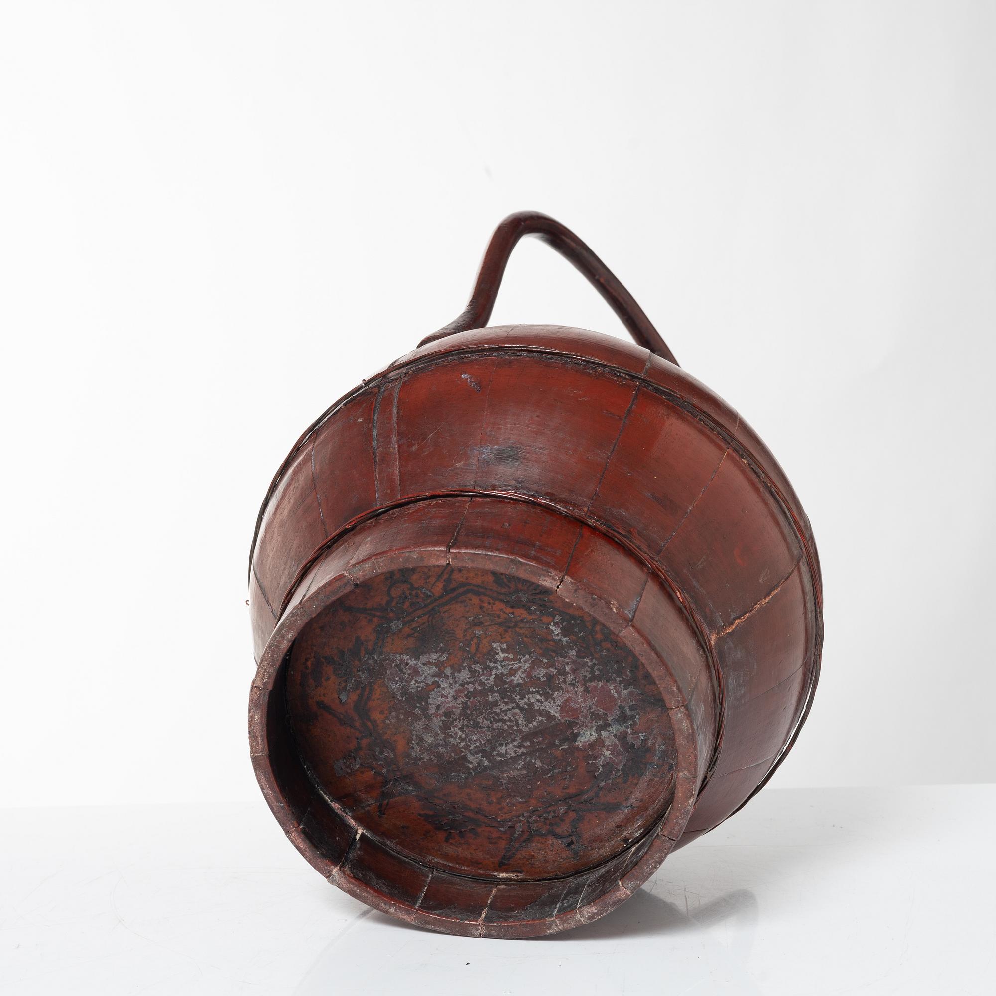 A group of three red wooden vessels, China/Southeast Asia, 20th century.