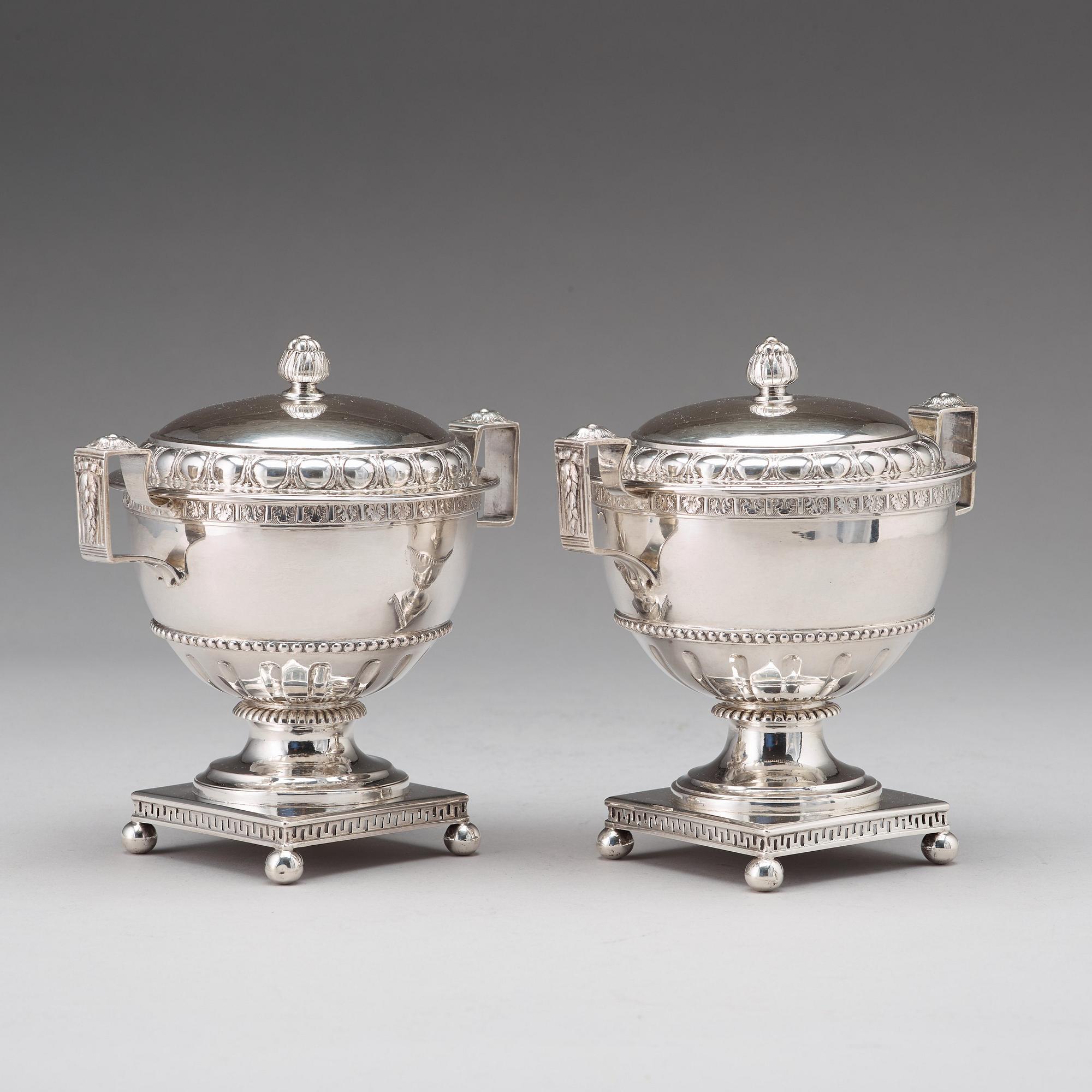 A pair of Swedish late 18th century silver sugar bowls and covers, mark of Pehr Zethelius, Stockholm 1780 and 1781.