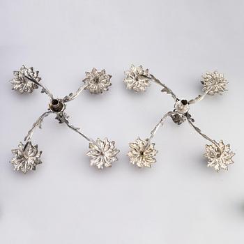 A pair of German 18th century silver candelabras, mark of C.C. Papcke, Stralsund.