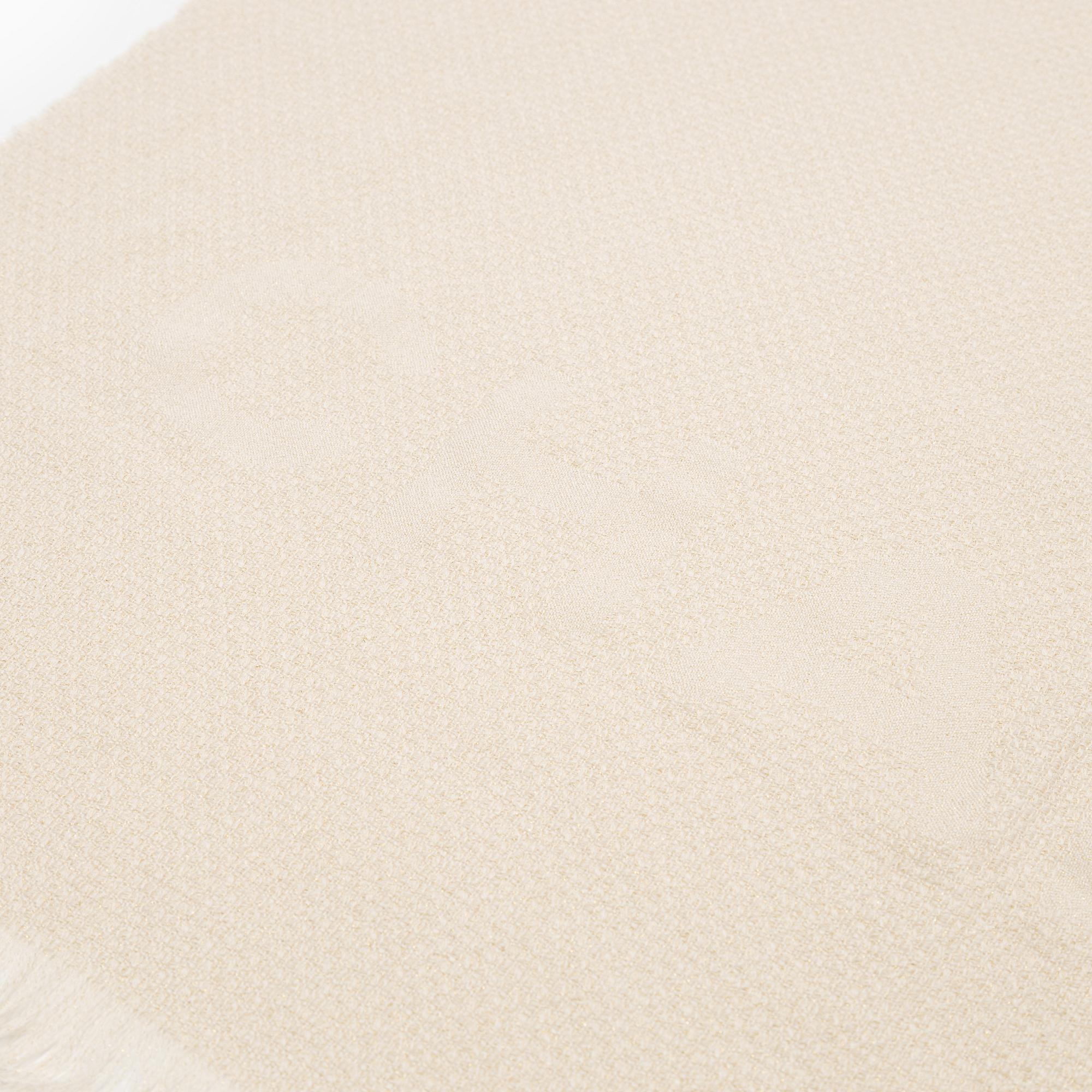 Chanel, a cashmere and silk-mix shawl.