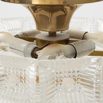 Carl Fagerlund, a pair of brass and glass ceiling lights, Orrefors.