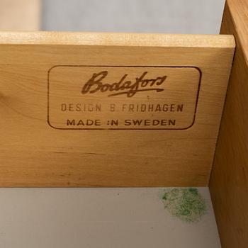 BERTIL FRIDHAGEN,BODAFORS. A set of three oak-veneered bookcases, later part of the 20th Century.