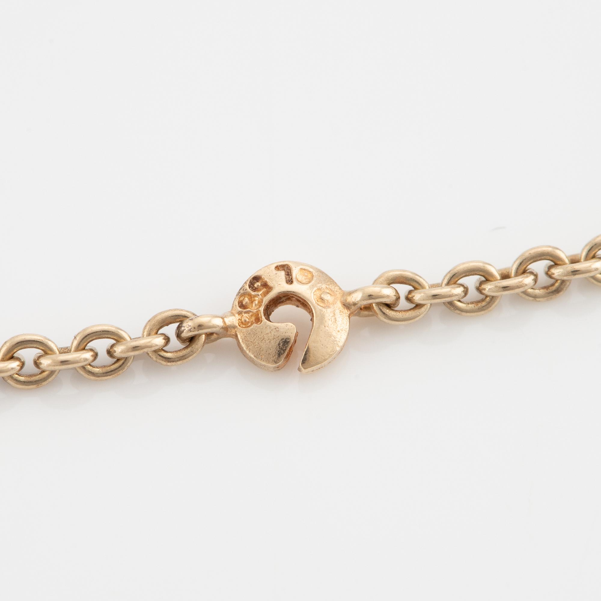 Ole Lynggaard, collier, 14K guld, hjärtformat lås med briljantslipade diamanter.