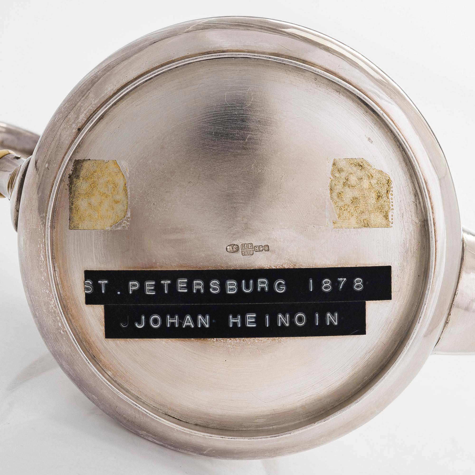 A 19th-century parcel-gilt silver teapot, maker's mark of Johan Heinoin, Saint Petersburg 1878.