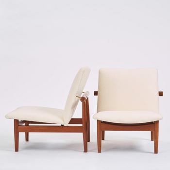 Finn Juhl, a pair of 'Japan' (FD-137) easy chairs and an ottoman, France & Son, Denmark, 1960s.