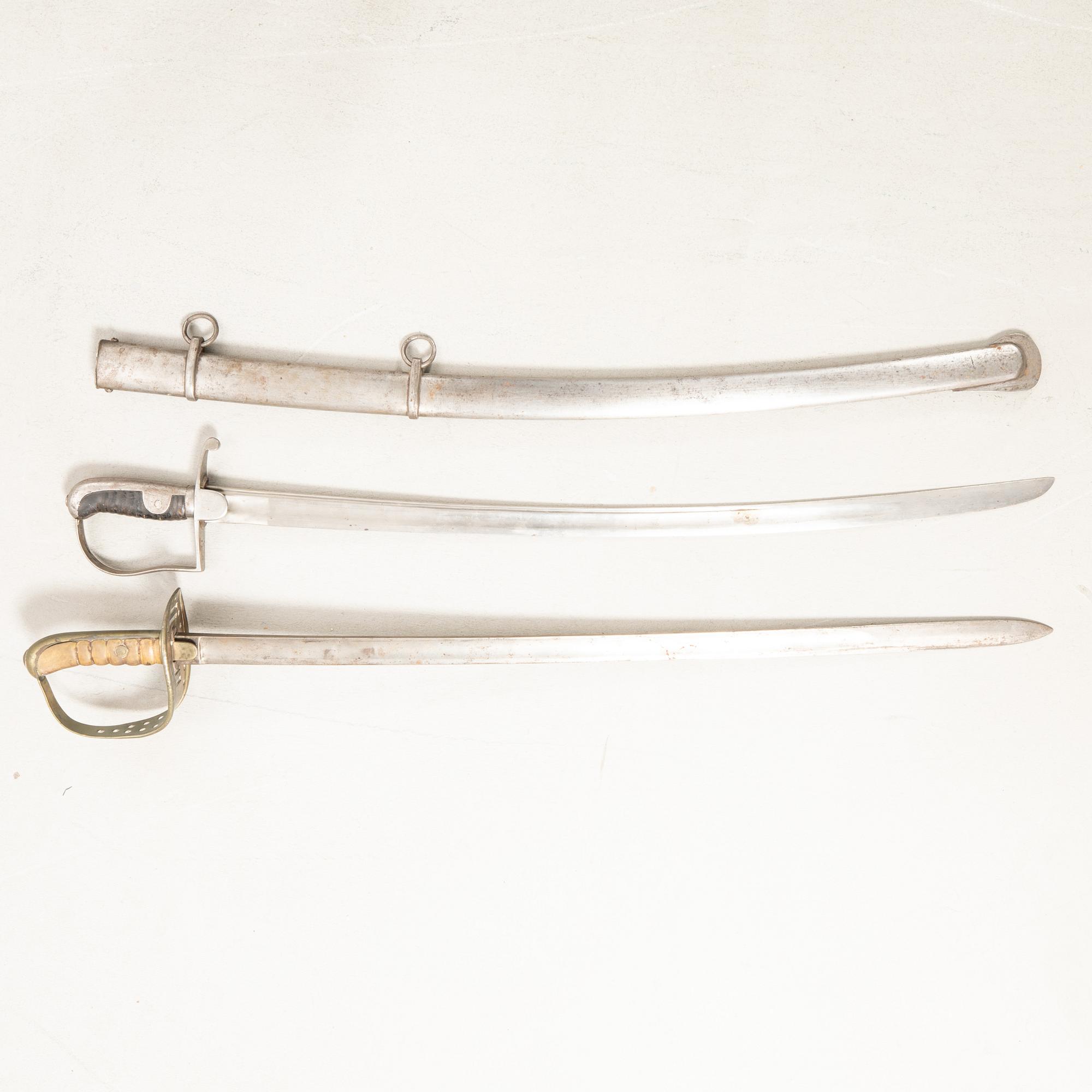 Swords 2 pcs, Swedish, m/1867 for the cavalry, and m/1831 for artillery personnel, with scabbard.