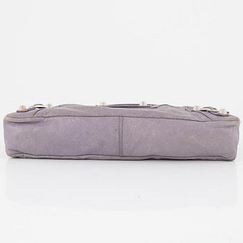 Balenciaga, a purple leather 'City' handbag.