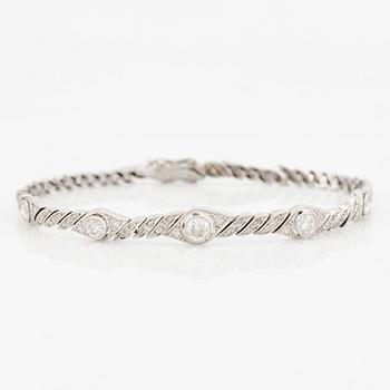 Bracelet in 18K white gold with round brilliant, octagon, and rose-cut diamonds.