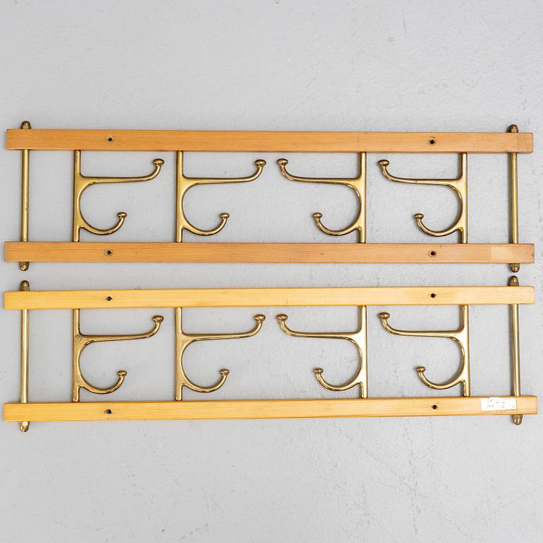 Klädhängare, ett par, "Dekorativ", Skoglunds metallgjuteri, Anderstorp, 1950/60-tal.