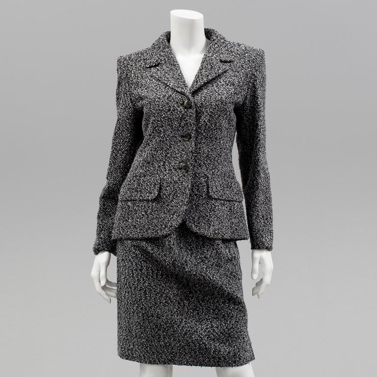 A womens two piece suit by Yves Saint Laurent.